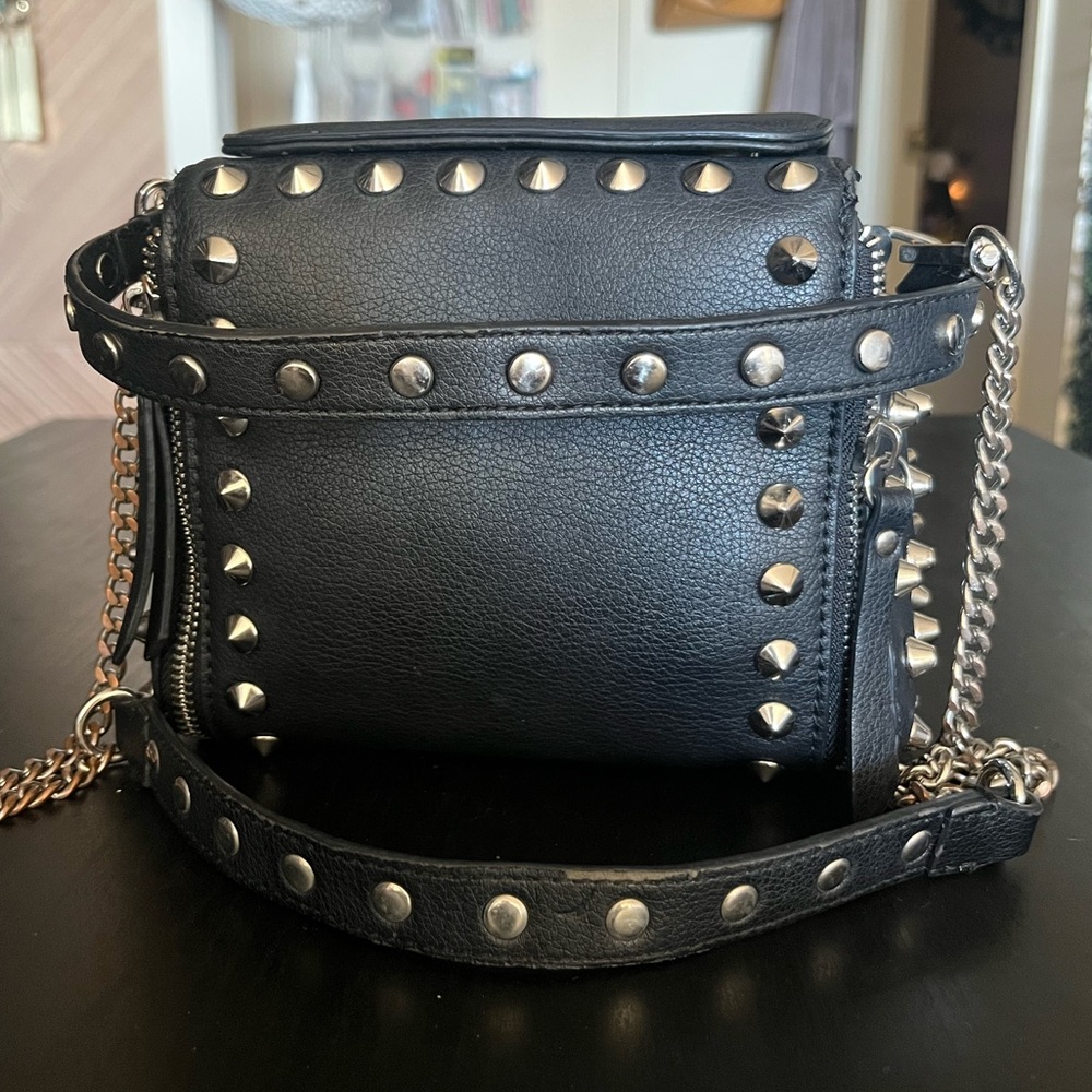 Badass black studded faux leather cross body zipper bag from Zara
